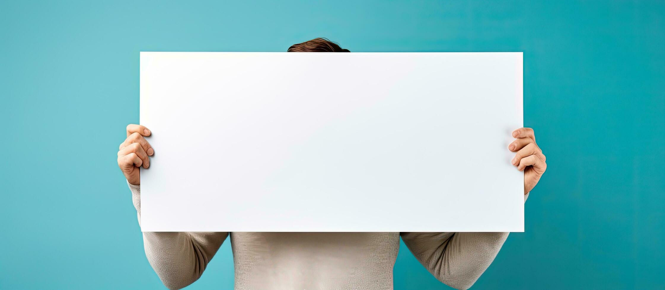 Person holding blank sign photo