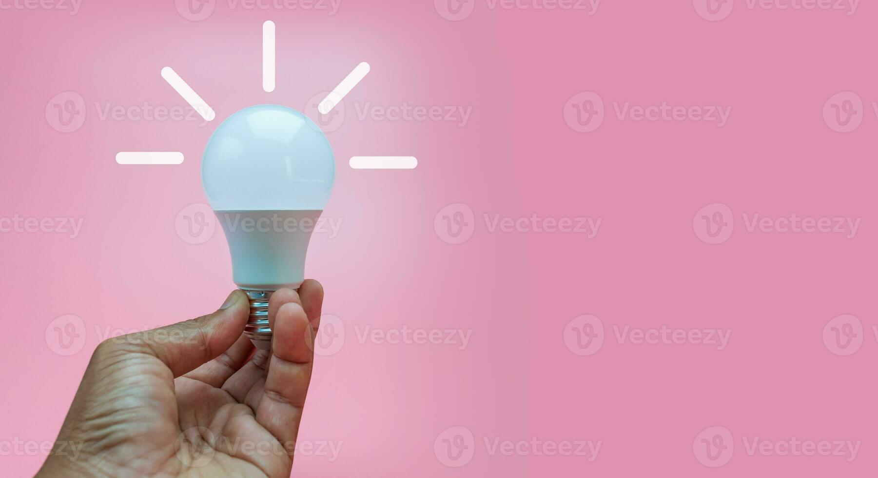 A light bulb in the pink background , New idea concept photo