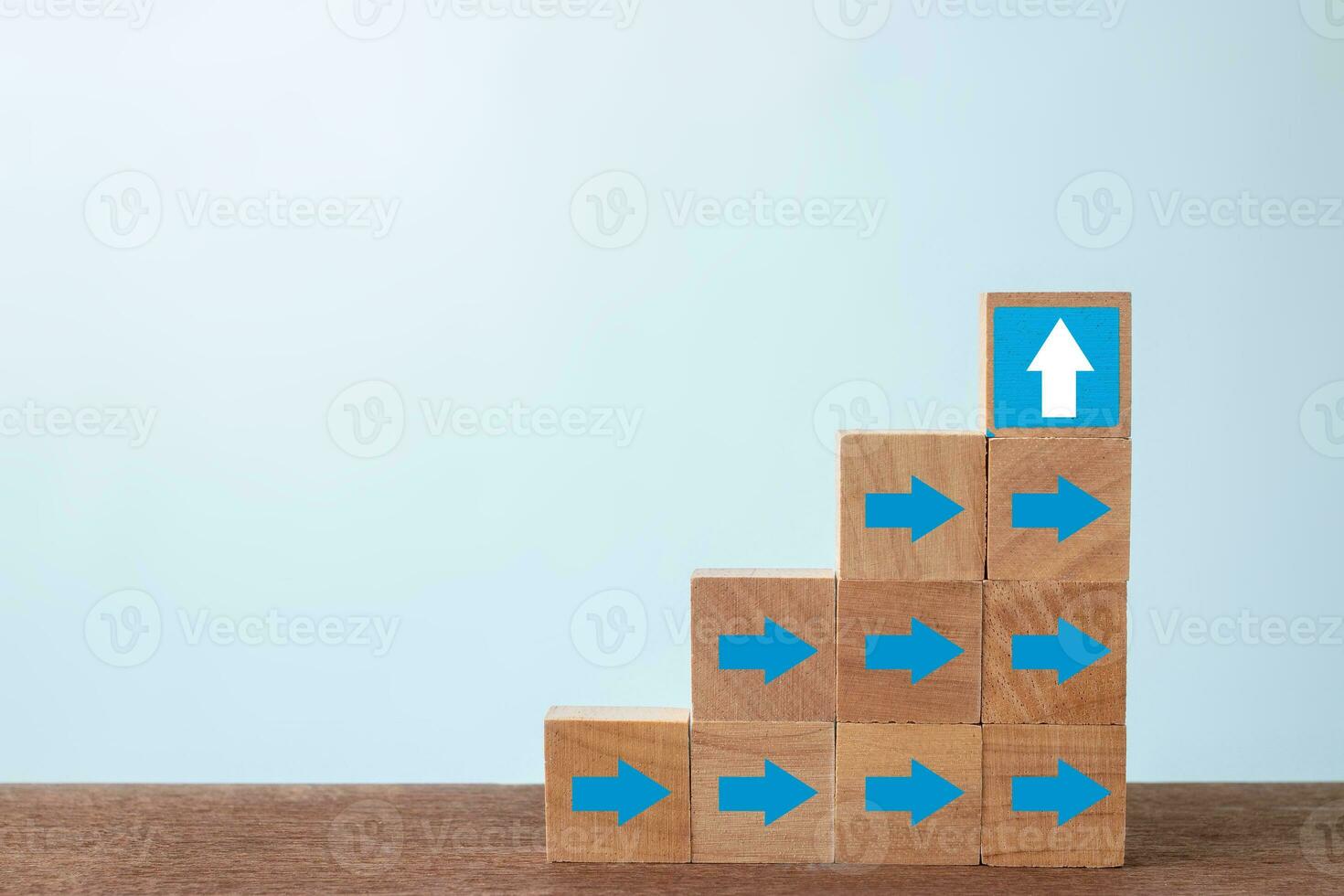 Different thinking and business growth concepts , Arrow on wooden block. photo