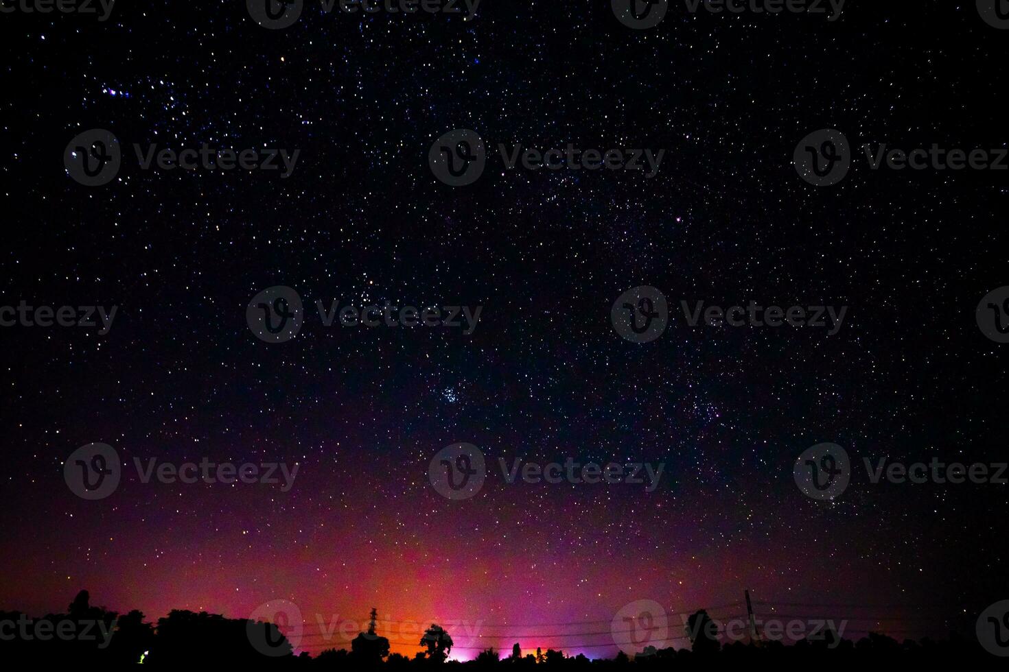 Night scenery with colorful and light yellow Milky Way Full of stars in the sky. photo