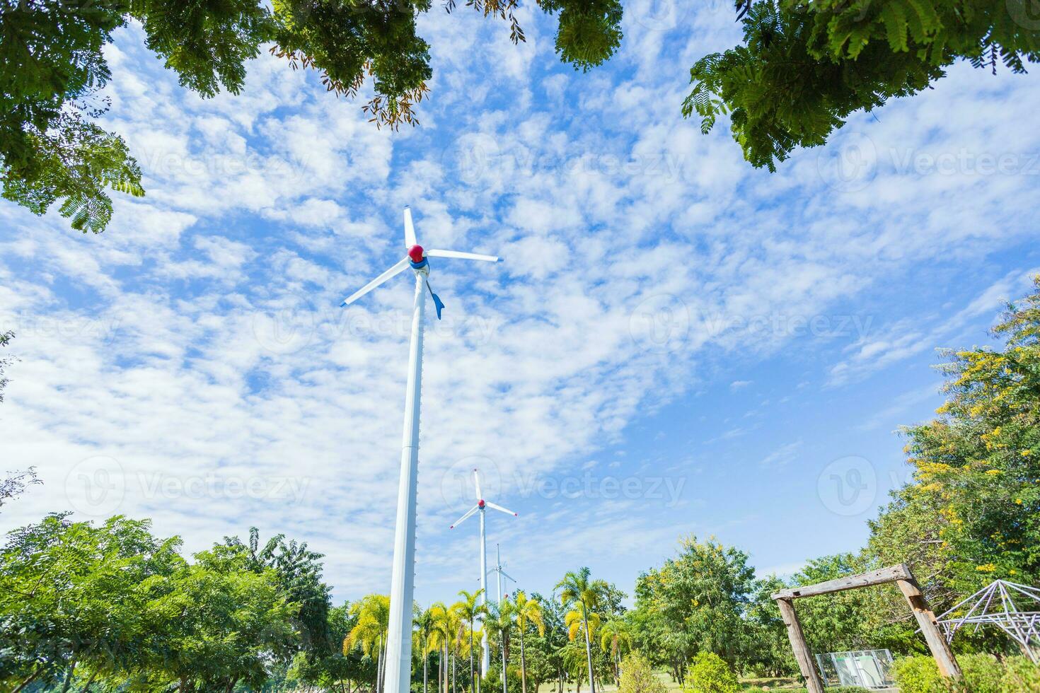 Environmentally friendly wind turbines in the park photo