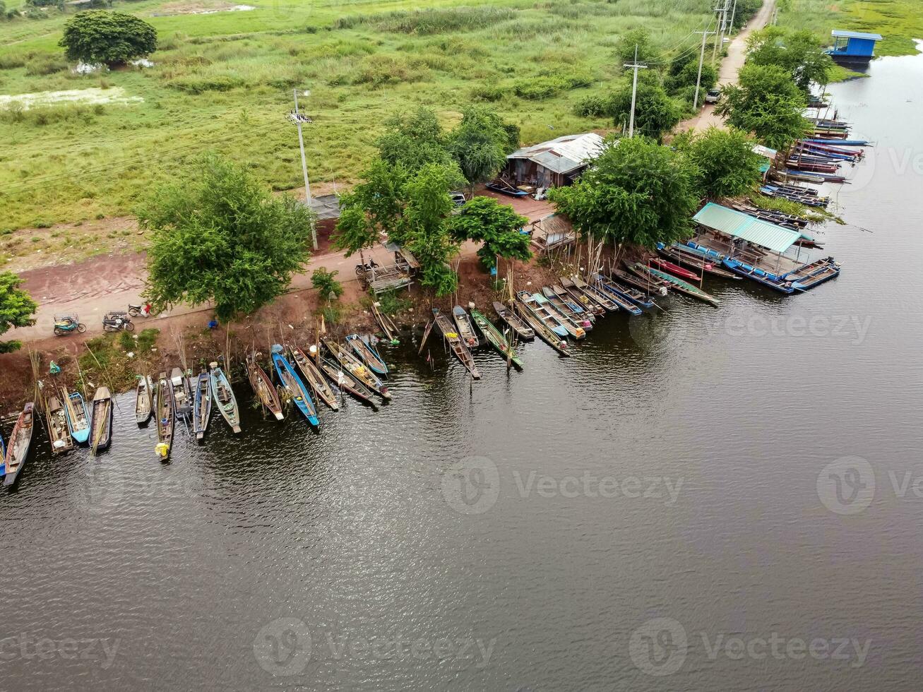 Many fishing boats land in the lagoon waiting to catch fish. photo