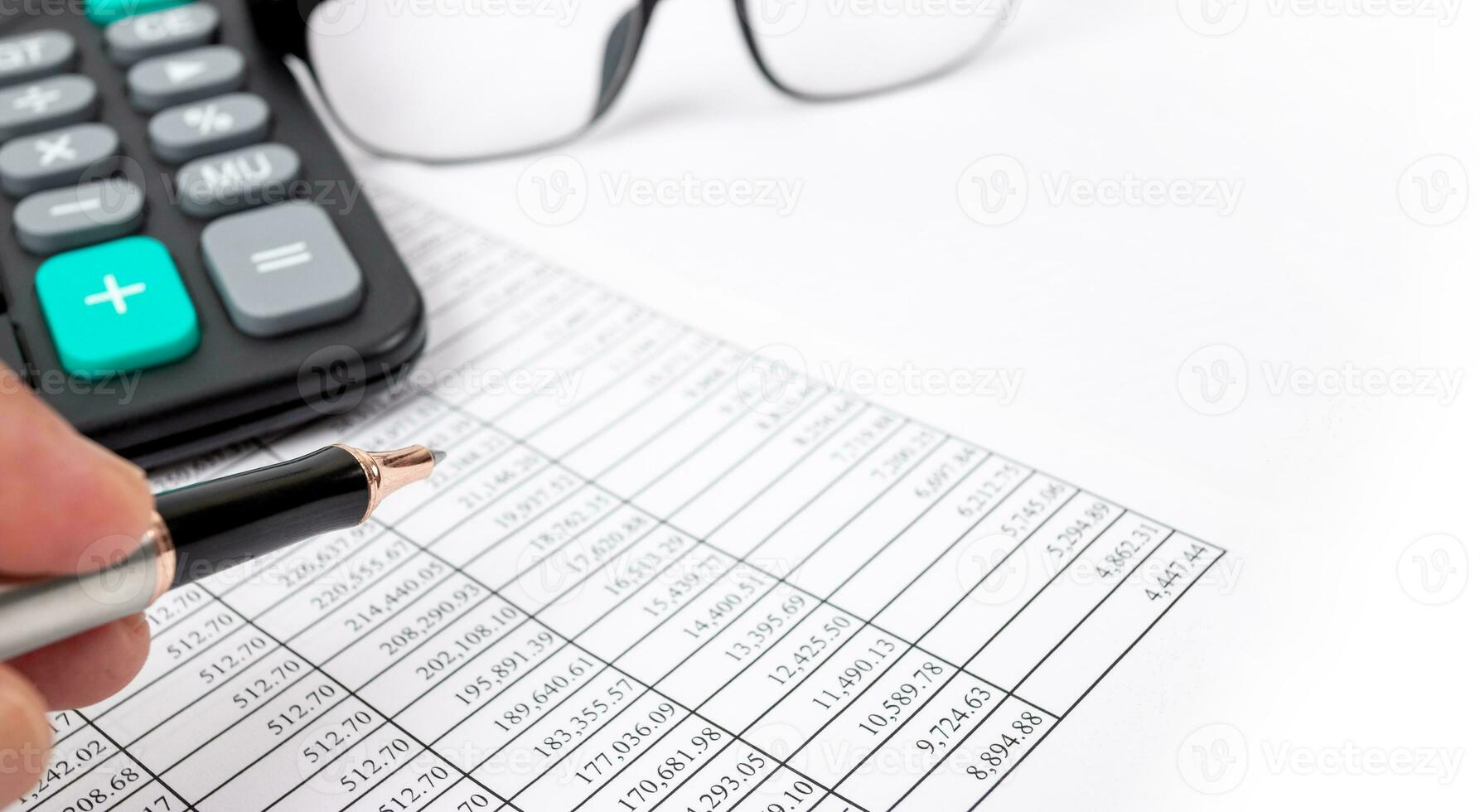 Financial concepts, financial numbers tables and calculators photo