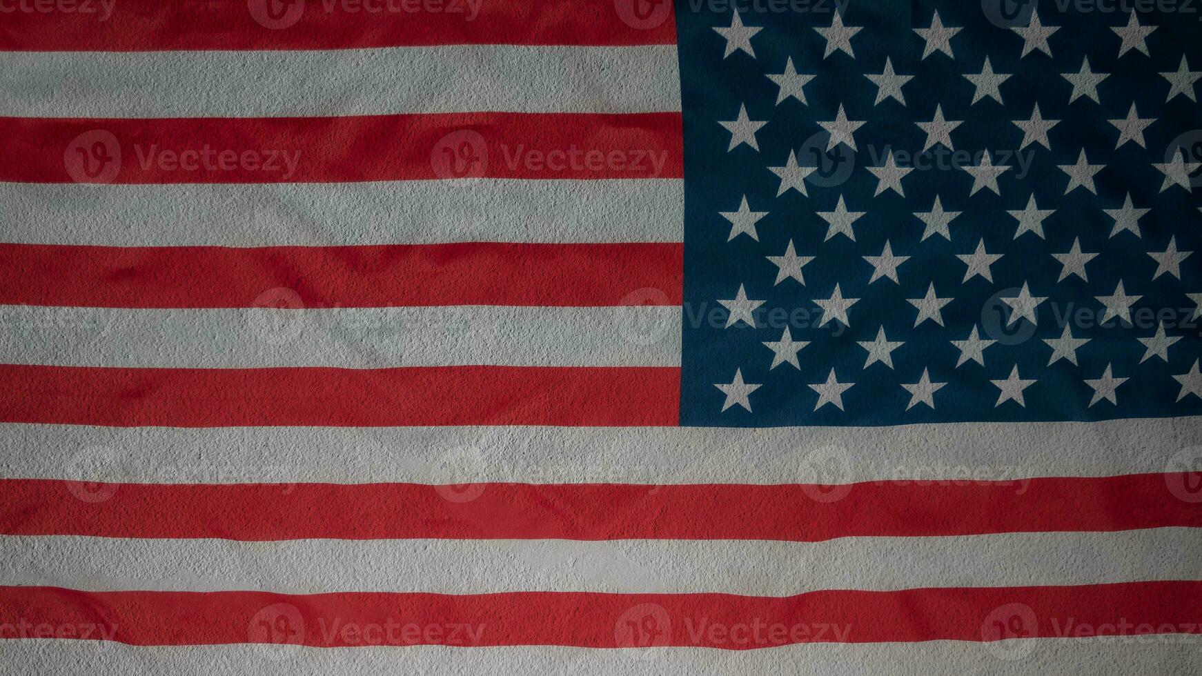 Abstract american flag on concrete cement wall, USA flag background with copy space. Top view photo