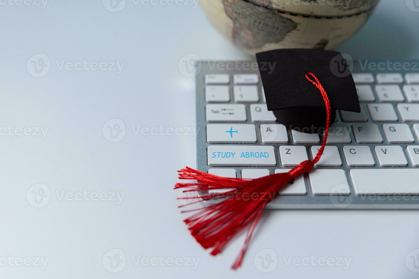 Graduation cap with Earth globe. Concept of global business study, abroad educational, Back to School. Education in Global world, Study abroad business in universities in worldwide. language study photo