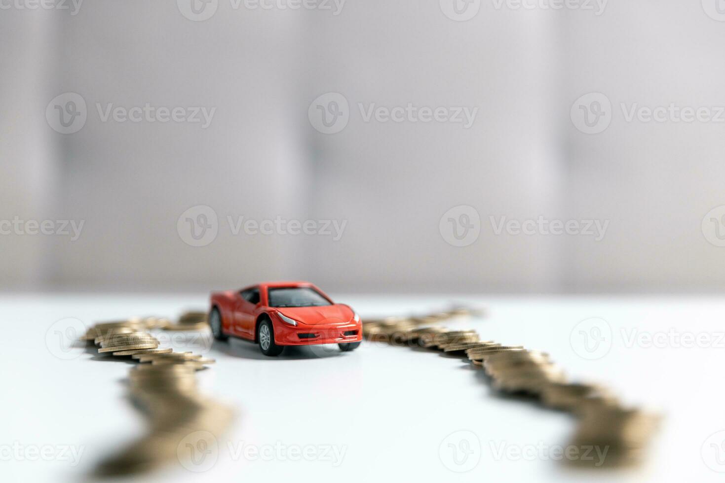 Signing a contract for the purchase of a new car, money cash, car, and car key on a contract agreement documents. Car, coins and calculator with copy space. photo