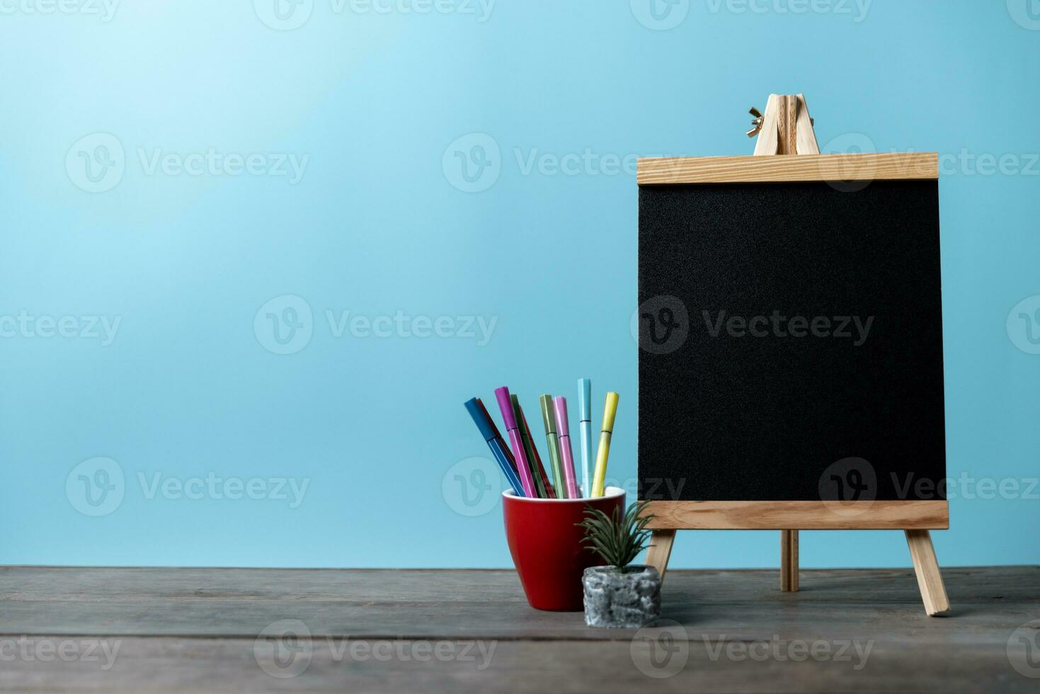 Kids desk creative workspace with school supplies, notebooks. Back to school concept. watercolor pencil need to bring for art class when you back to school. photo