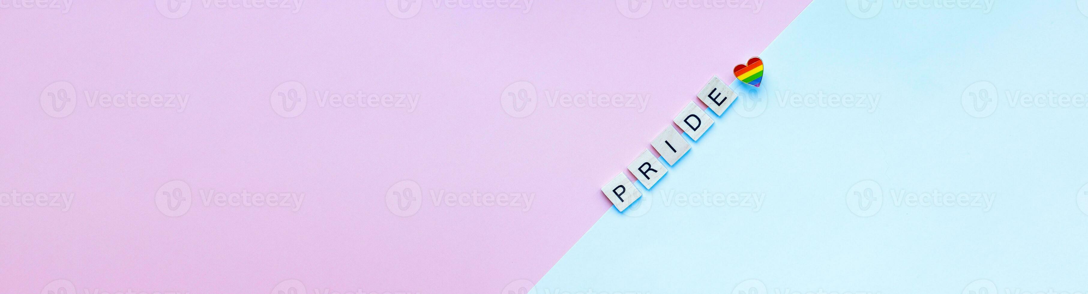 Banner Flat lay Word pride from wooden letters. Pride month and day. LGBTQ. photo