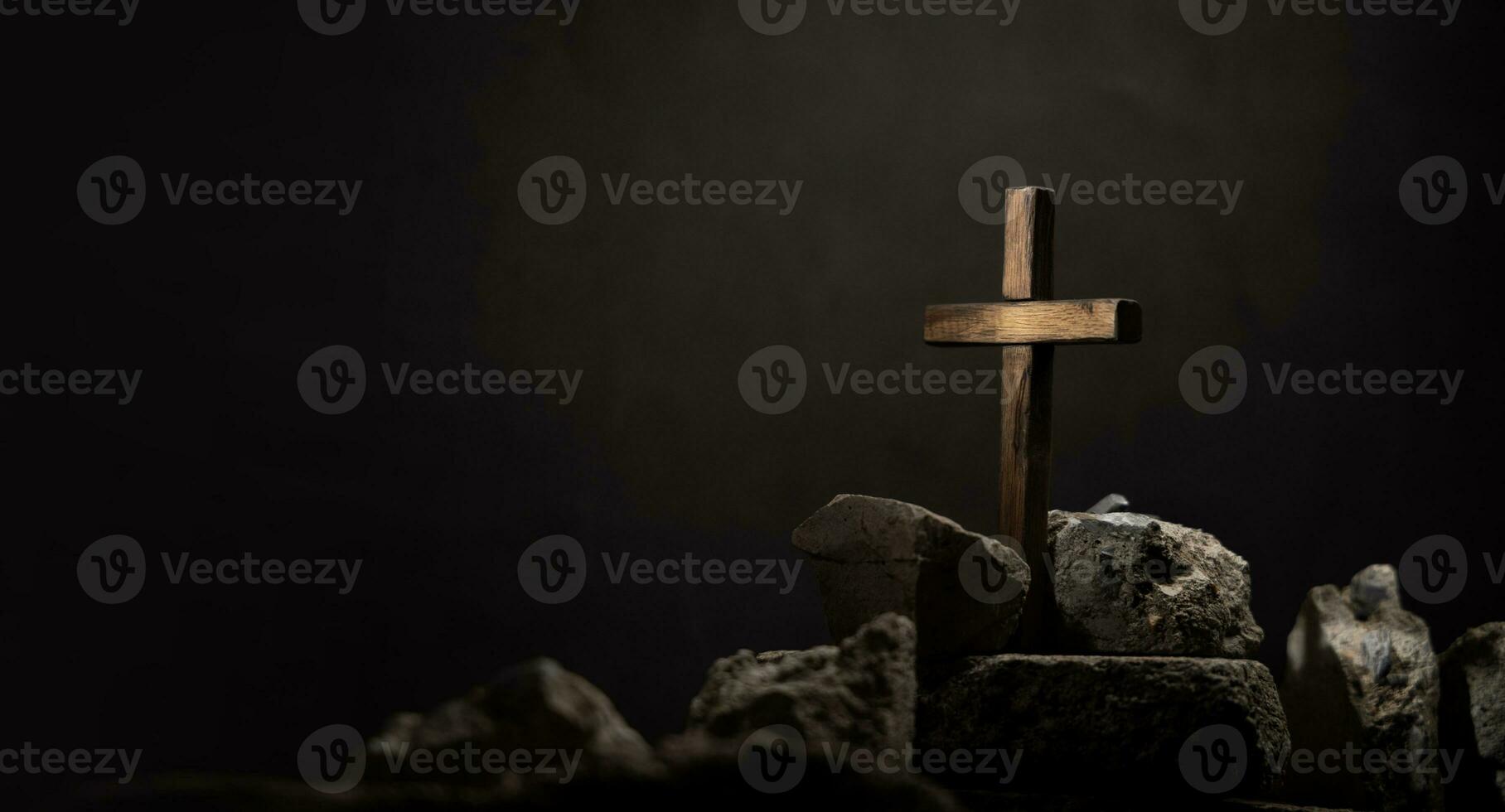 Spirituality, Religion and Hope Concept. Praying in the Dark Place. Supplication, Believe and Faith for Human. Hope in the midst of the Broken. Cross on  Wreckage Concrete. Light Shining on the Cross photo