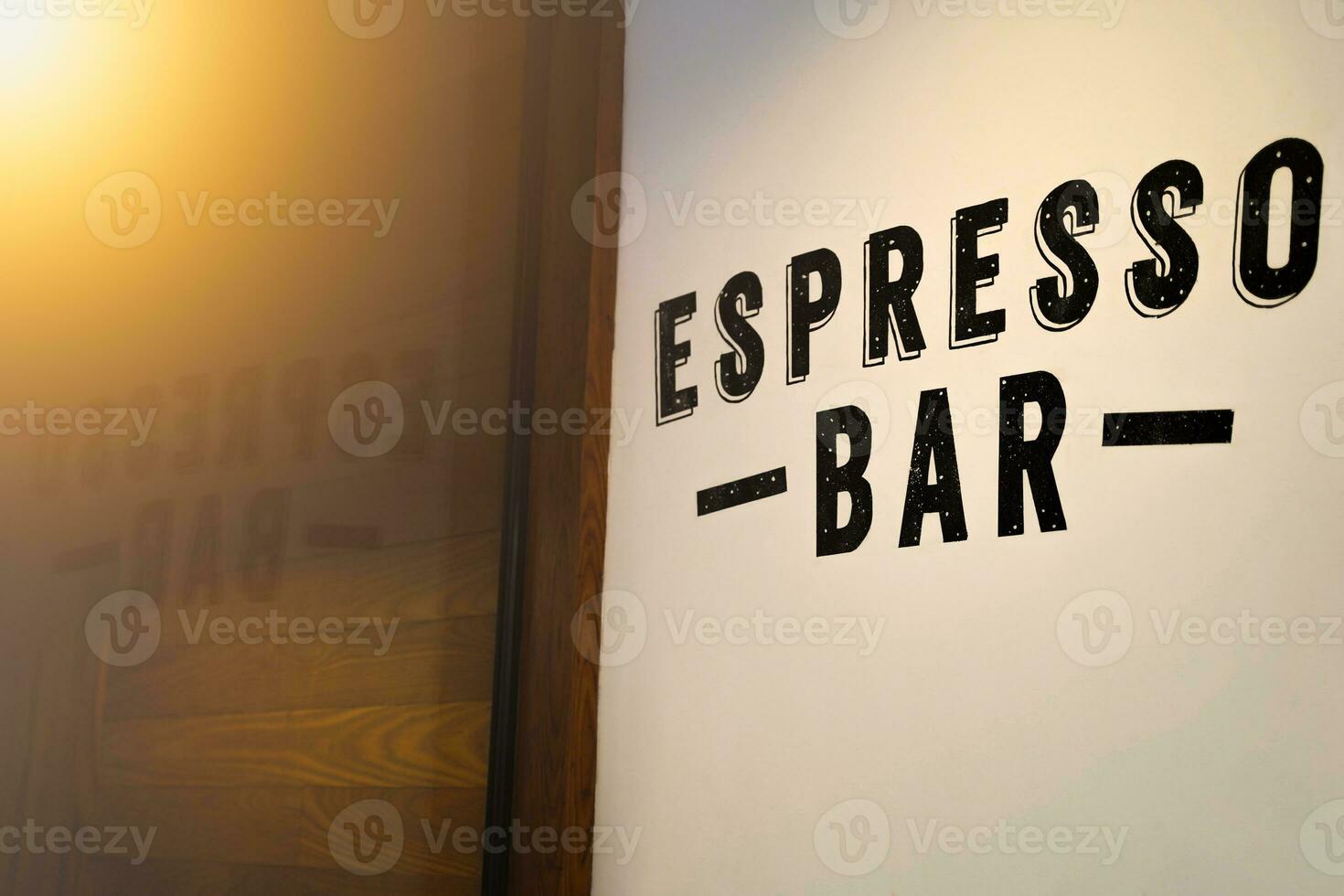 An inscription of a front coffee shop, on a wall cafe font typography, typing espresso bar photo