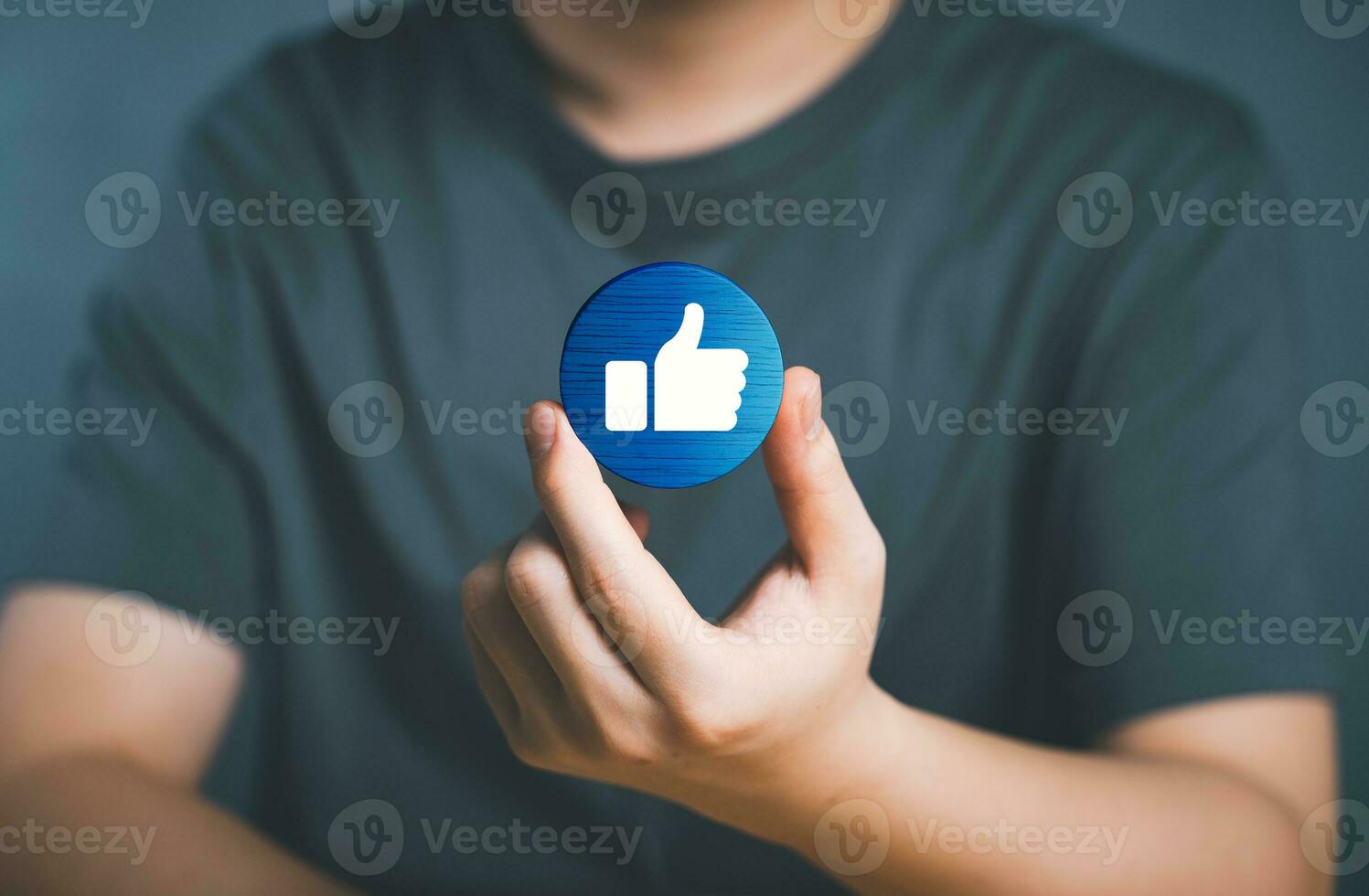 Hand of customer picking Like button on Social media. The concept of Social media and digital online. Watch Live streaming and message, likes, emoji feedback, satisfaction, review, evaluation concept. photo