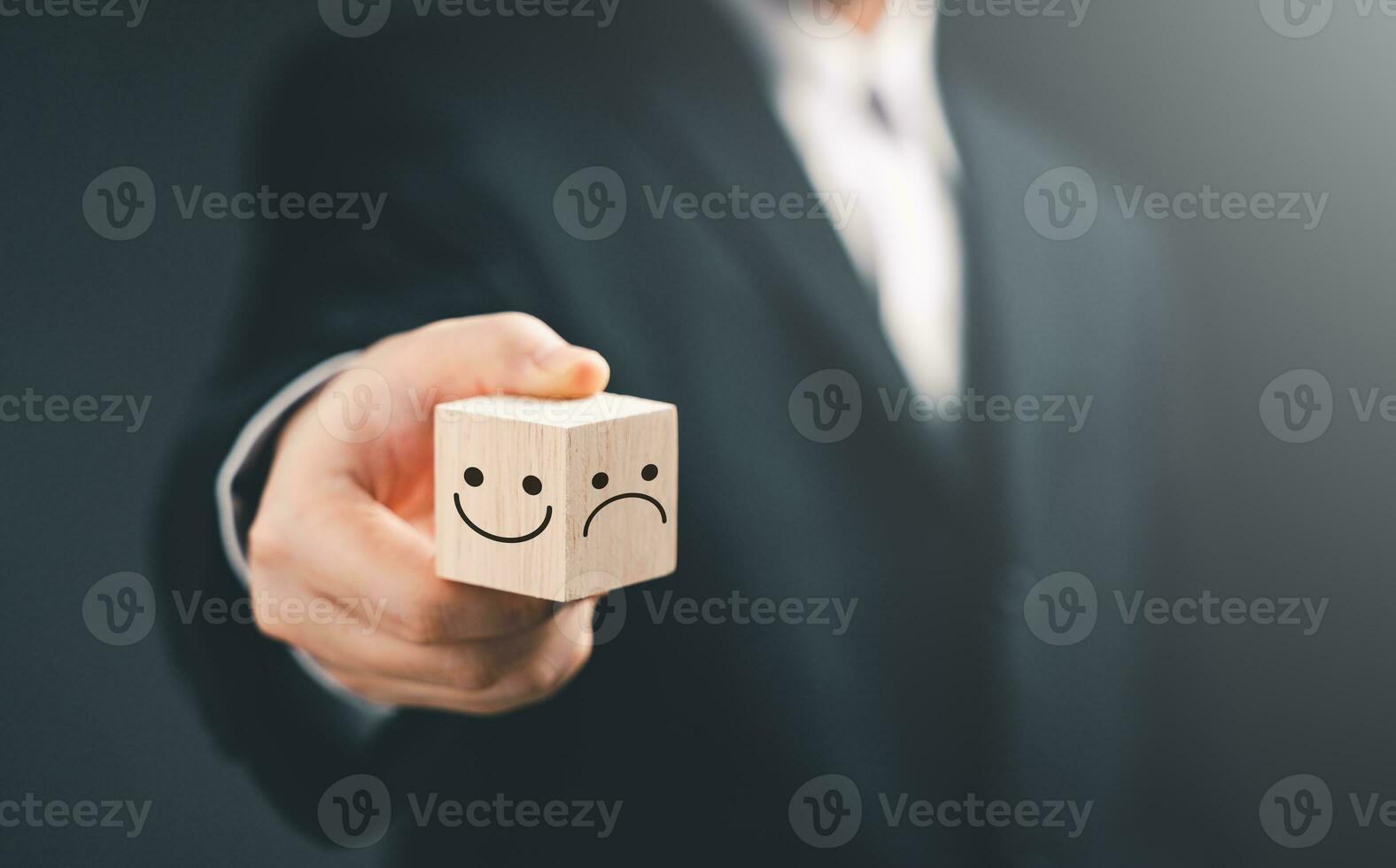 Mindset, Mental health and Emotional state concept, Business man show wooden block for happy Smile face growth mindset and sad face negative. The positive thinking selection Review rating satisfaction photo