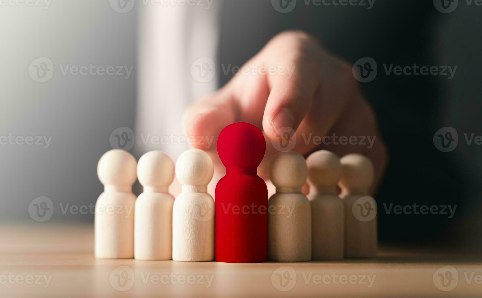 Leadership, Human resource, Manager, CEO, Competition. Business man finding choosing red wooden figure, leaders, business success, Personnel selection, Job human resources, teamwork, Target customer. photo