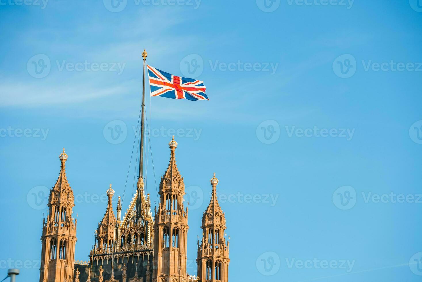 UK flag with Big Ben and House of Parliament in the background photo