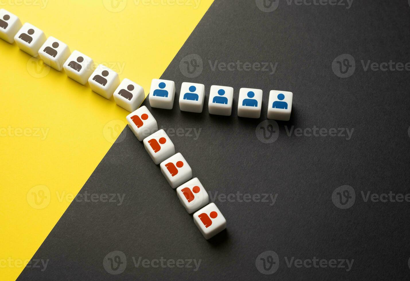 People are divided into two groups. Opposition factions. Lack of consensus. Ideological conflict. Rivalry to improve work efficiency. Dividing, splitting up. photo