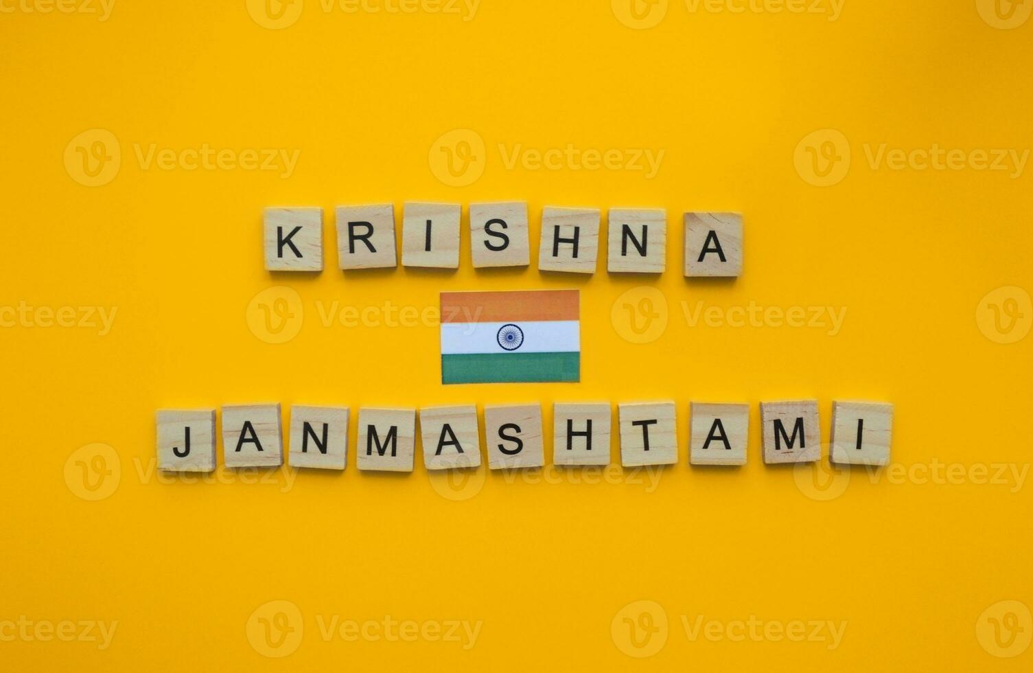 September 6, Krishna Janmashtami, flag of India, minimalistic banner with inscription in wooden letters photo