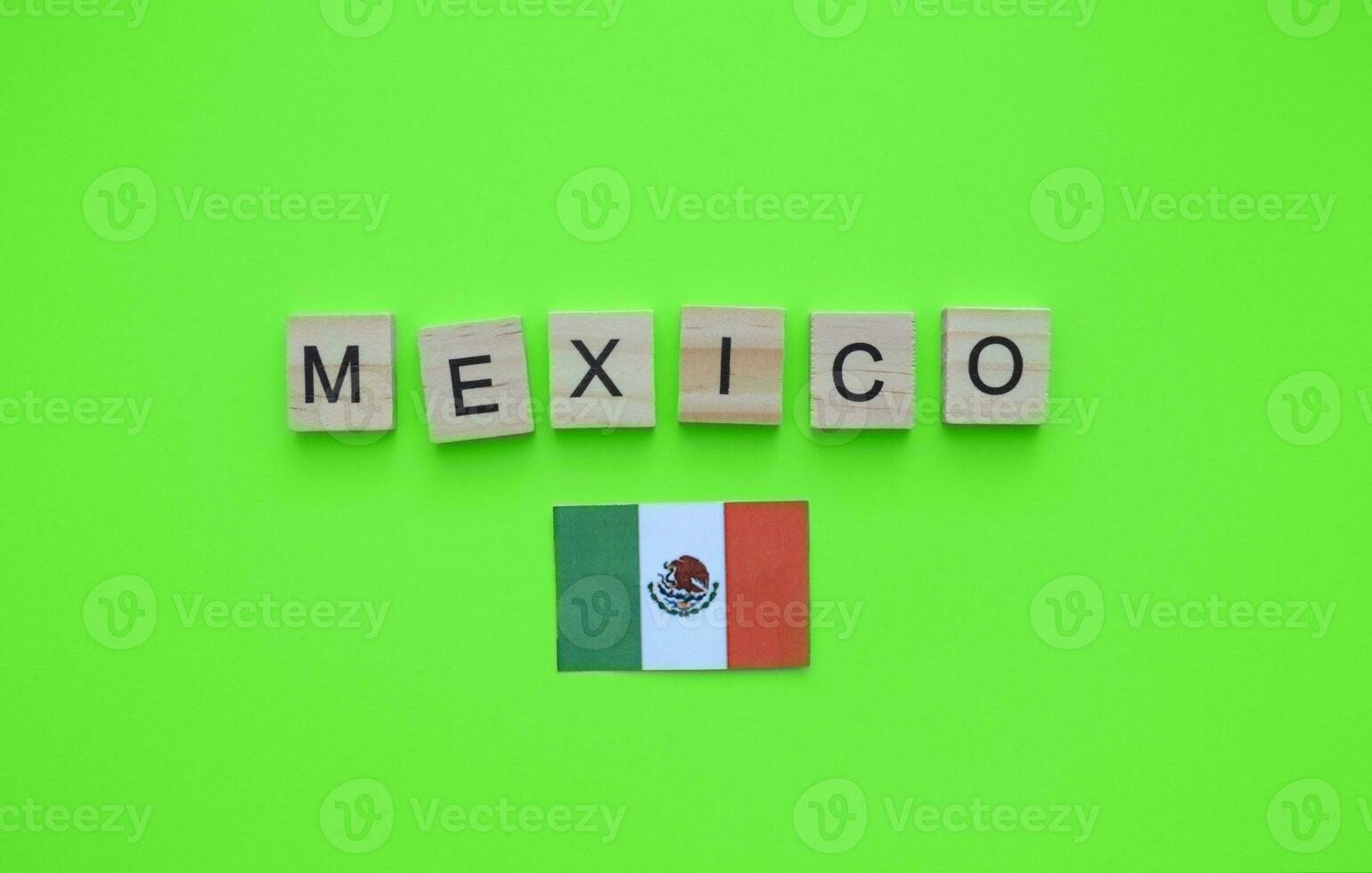 September 16, Independence Day of Mexico, flag of Mexico, minimalistic banner with the inscription in wooden letters photo