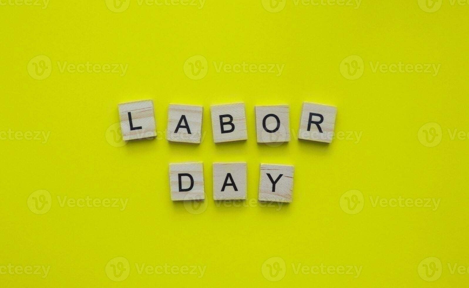 September 3, Labor Day, minimalistic banner with the inscription in wooden letters photo