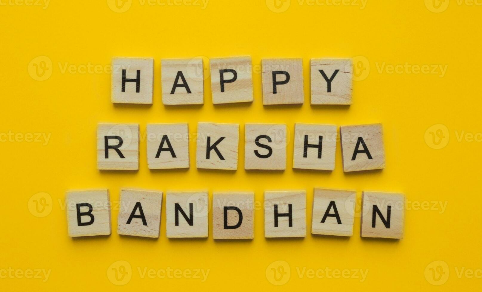 On August 30, Happy Raksha Bandhan, a minimalistic banner with an inscription in wooden letters photo