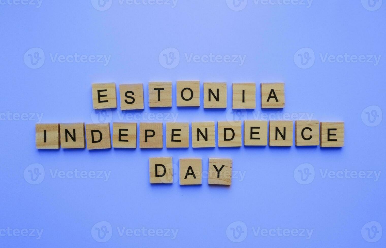 August 20, Estonia Independence Restoration Day, minimalistic banner with the inscription in wooden letters on a blue background photo