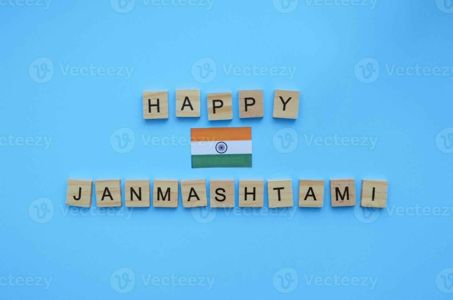 September 6, happy Krishna Janmashtami, flag of India, minimalistic banner with inscription in wooden letters photo