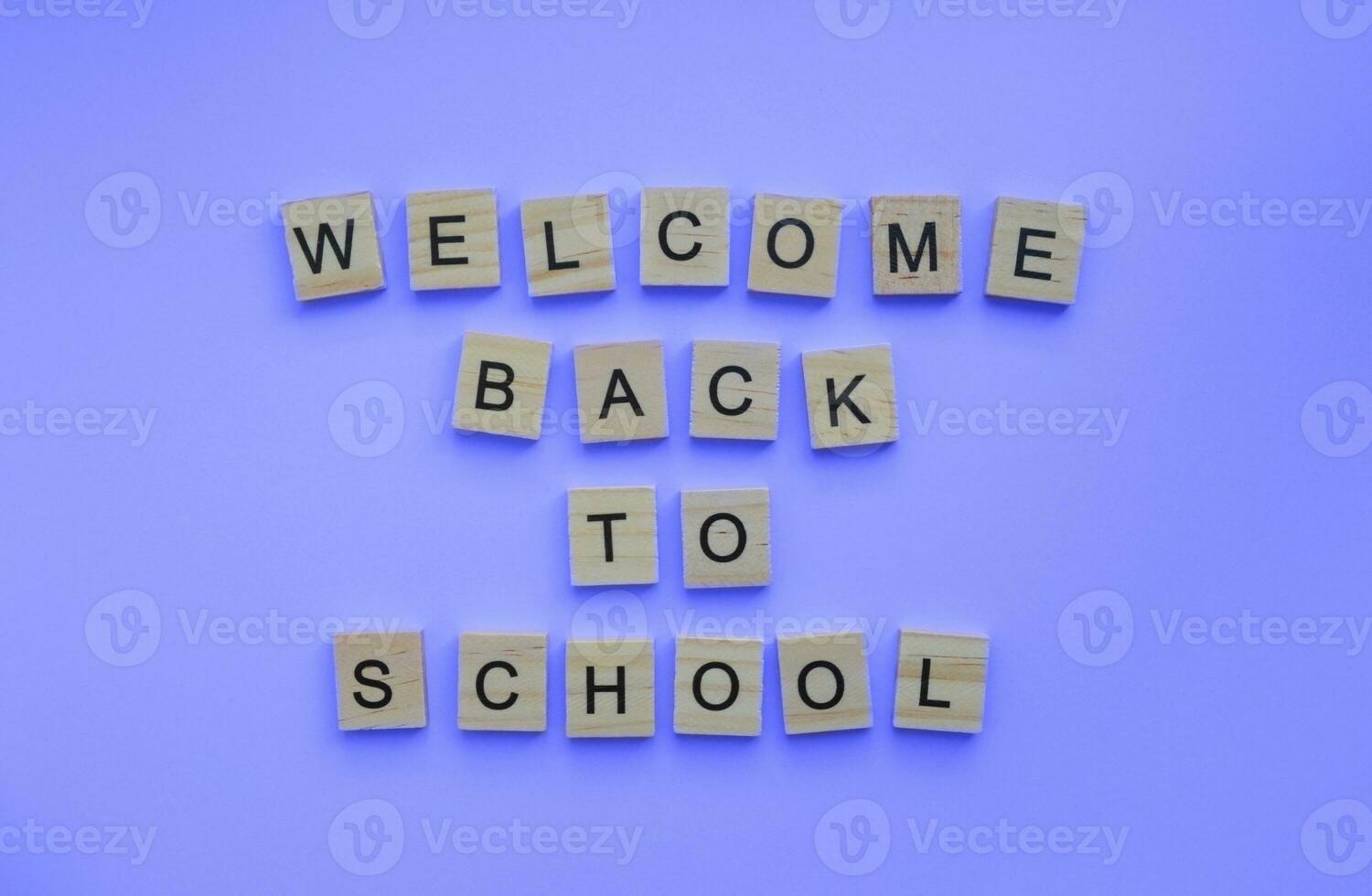 September 1, Knowledge Day, welcome Back to school, minimalistic banner with the inscription in wooden letters photo
