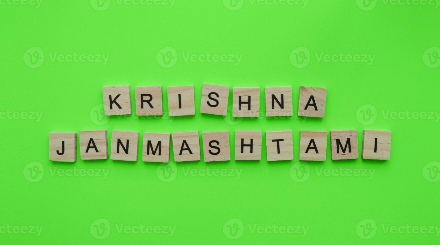 September 6, Krishna Janmashtami, a minimalistic banner with an inscription in wooden letters photo