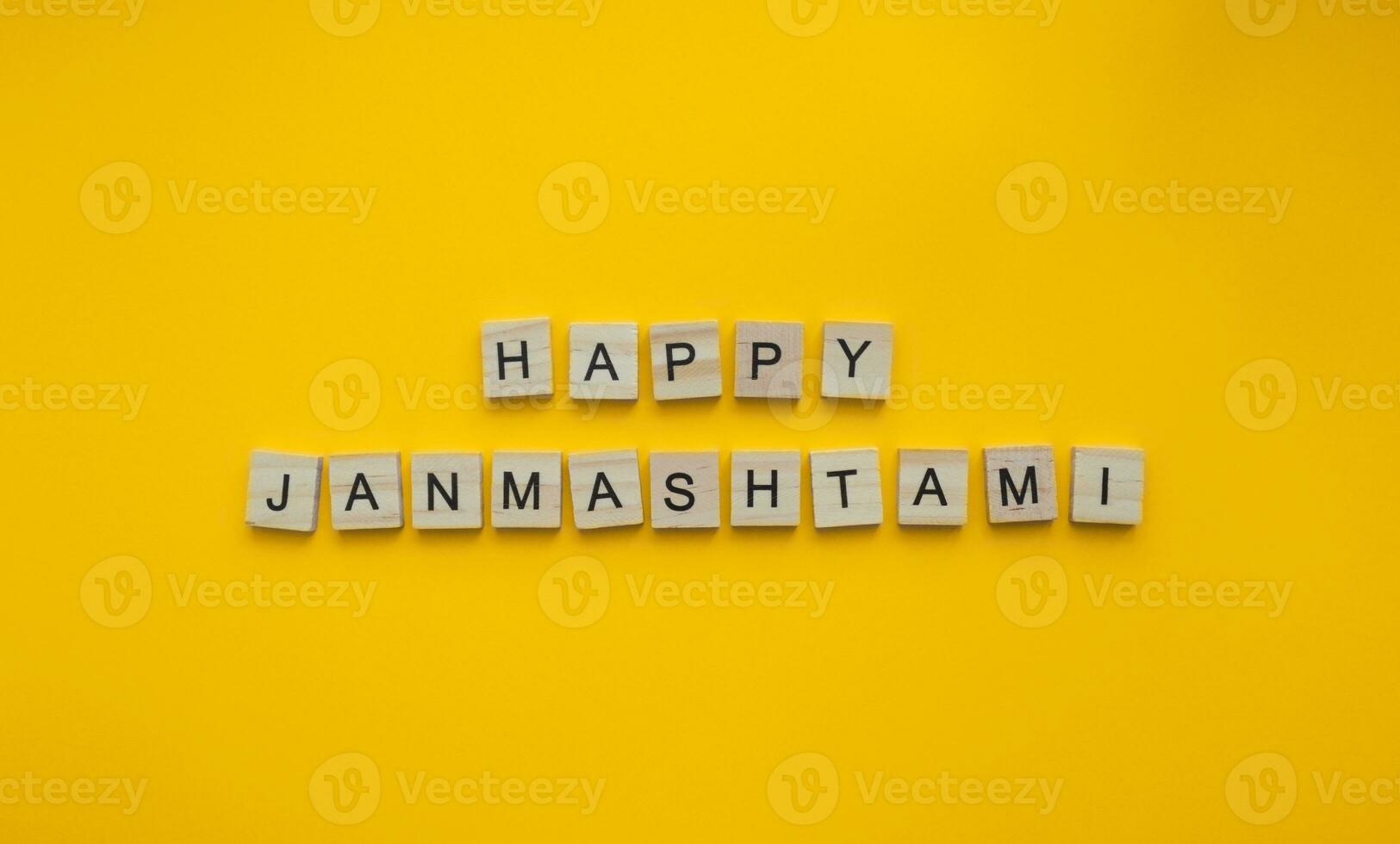 On September 6, happy Krishna Janmashtami, a minimalistic banner with an inscription in wooden letters photo