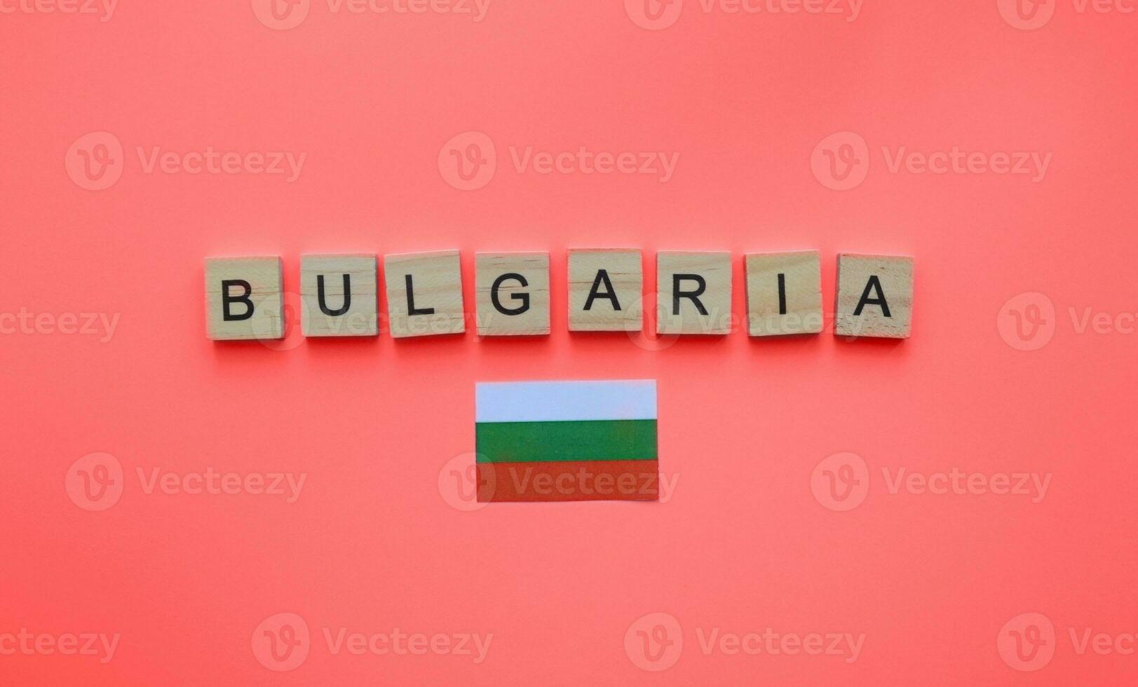 September 6, Unification Day in Bulgaria, flag of Bulgaria, minimalistic banner with the inscription in wooden letters photo