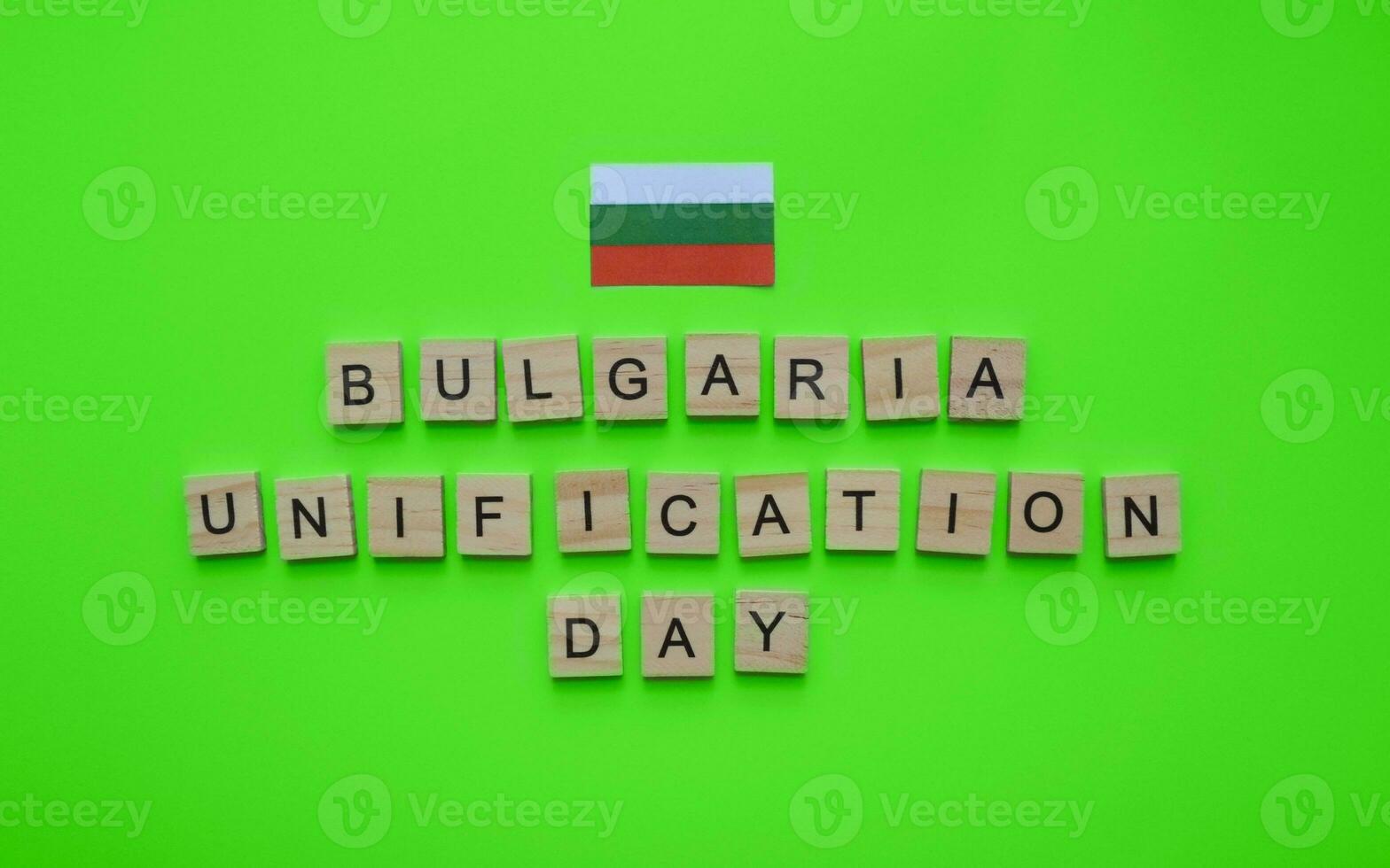September 6, Unification Day in Bulgaria, flag of Bulgaria, minimalistic banner with the inscription in wooden letters on a green background photo