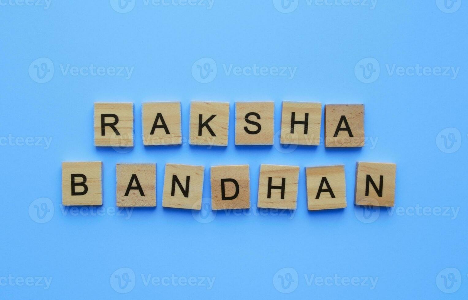 August 30, Raksha Bandhan, a minimalistic banner with an inscription in wooden letters photo