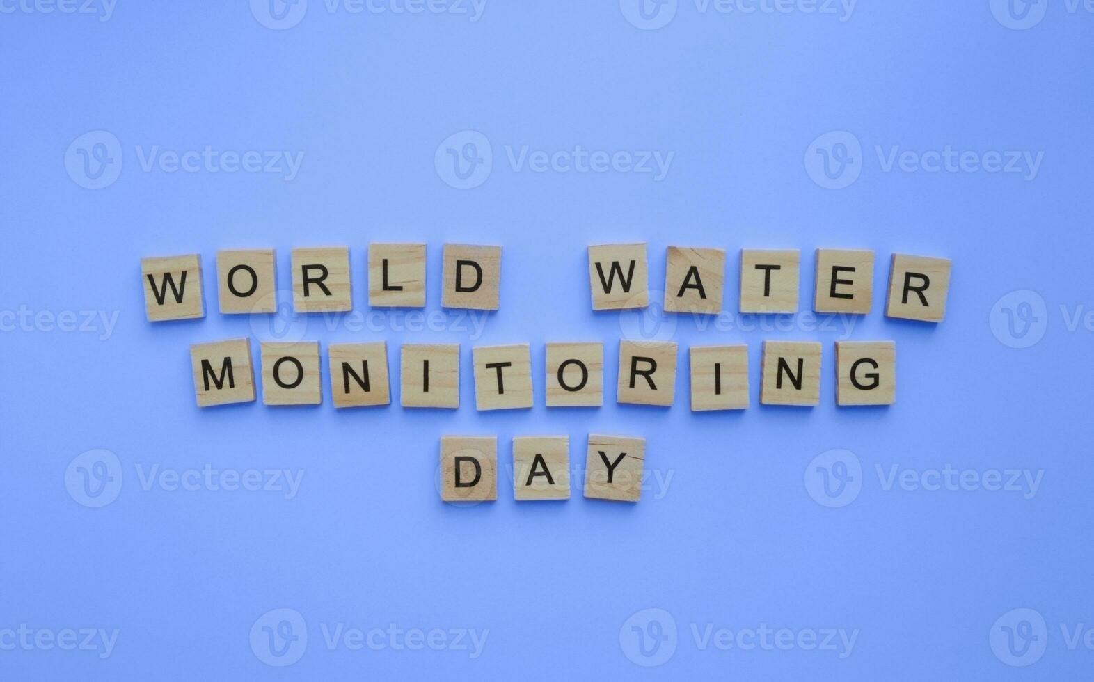 September 18, World Water Monitoring Day, minimalistic banner with the inscription in wooden letters photo