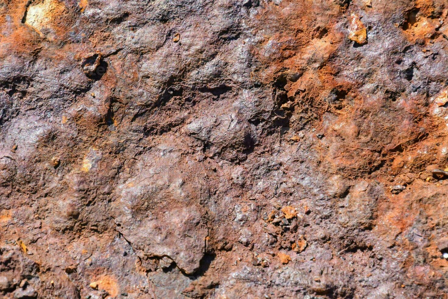 a close up of rock wall photo