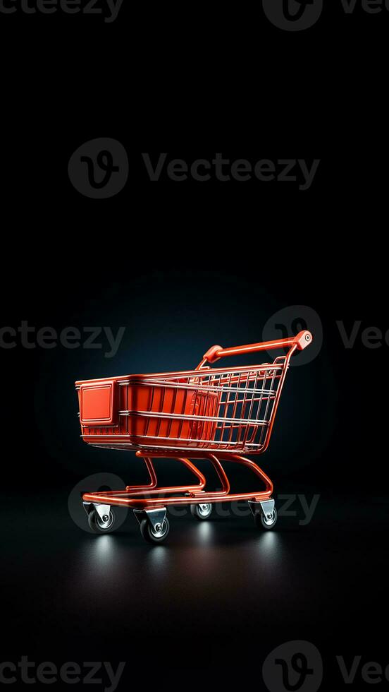 Black background with an isolated shopping cart. photo
