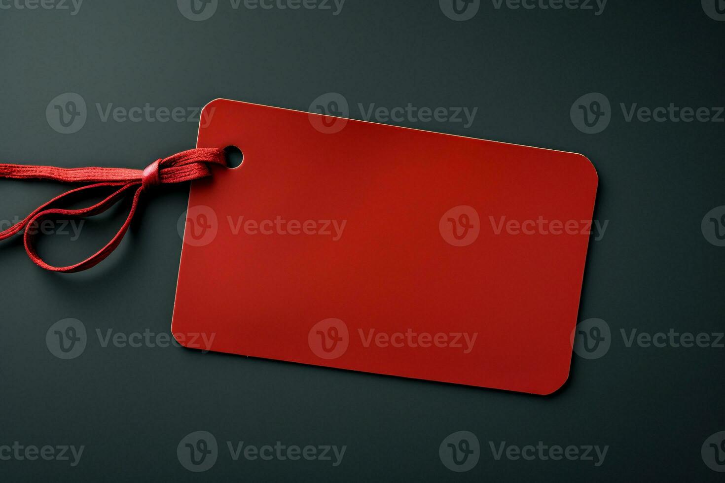 Red empty price tag on black or dark background. Black Friday concept, template copyspace photo