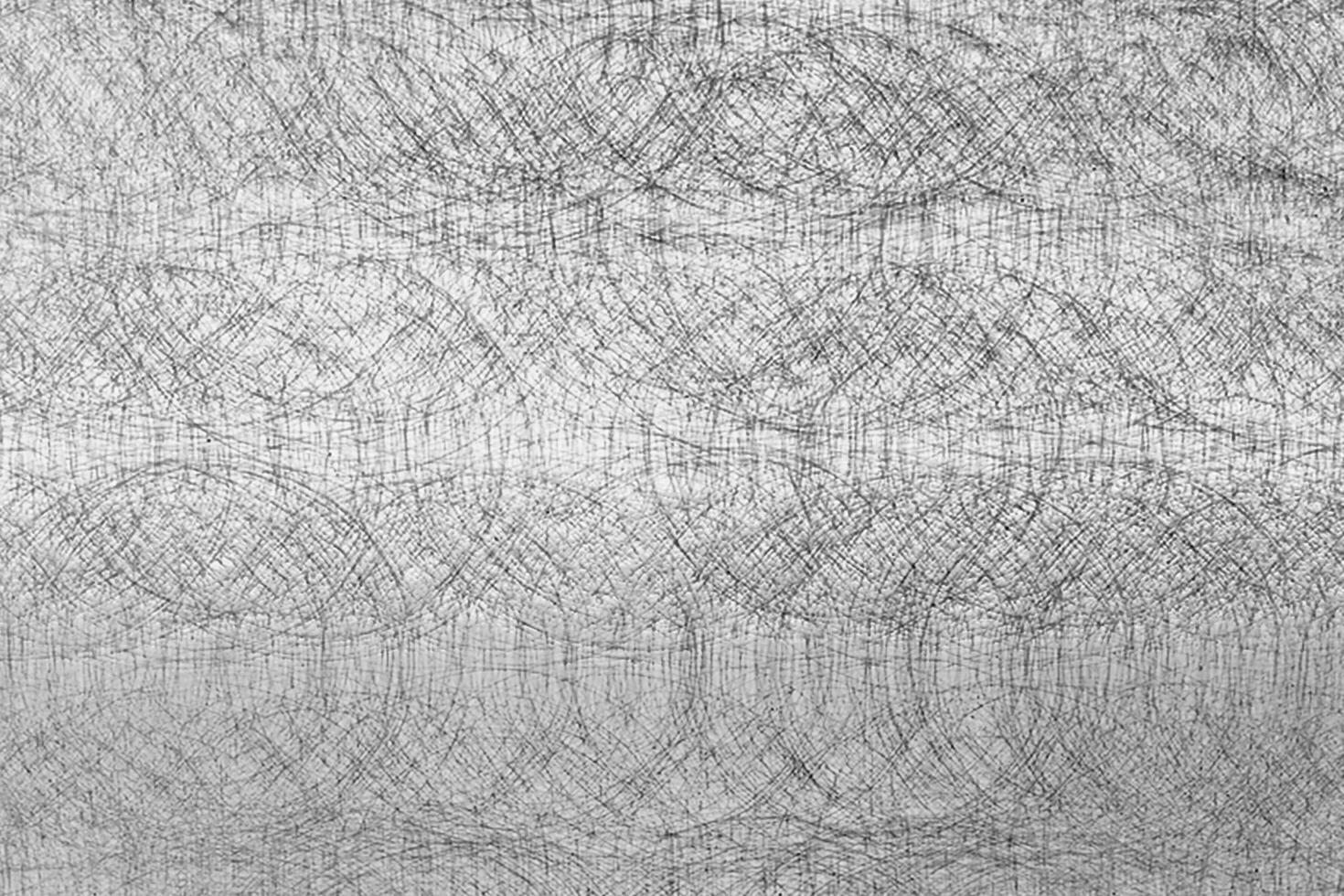 Circularly scratched metal texture black and white overlay photo