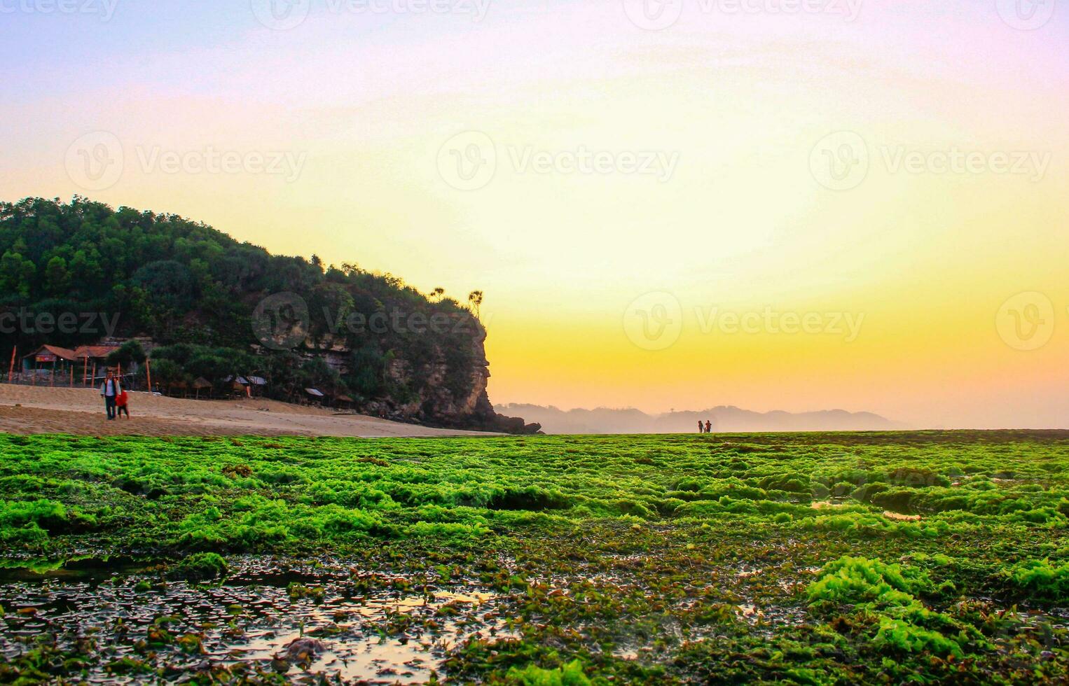 sunrise in the mountains. morning view of the beach and cliff photo