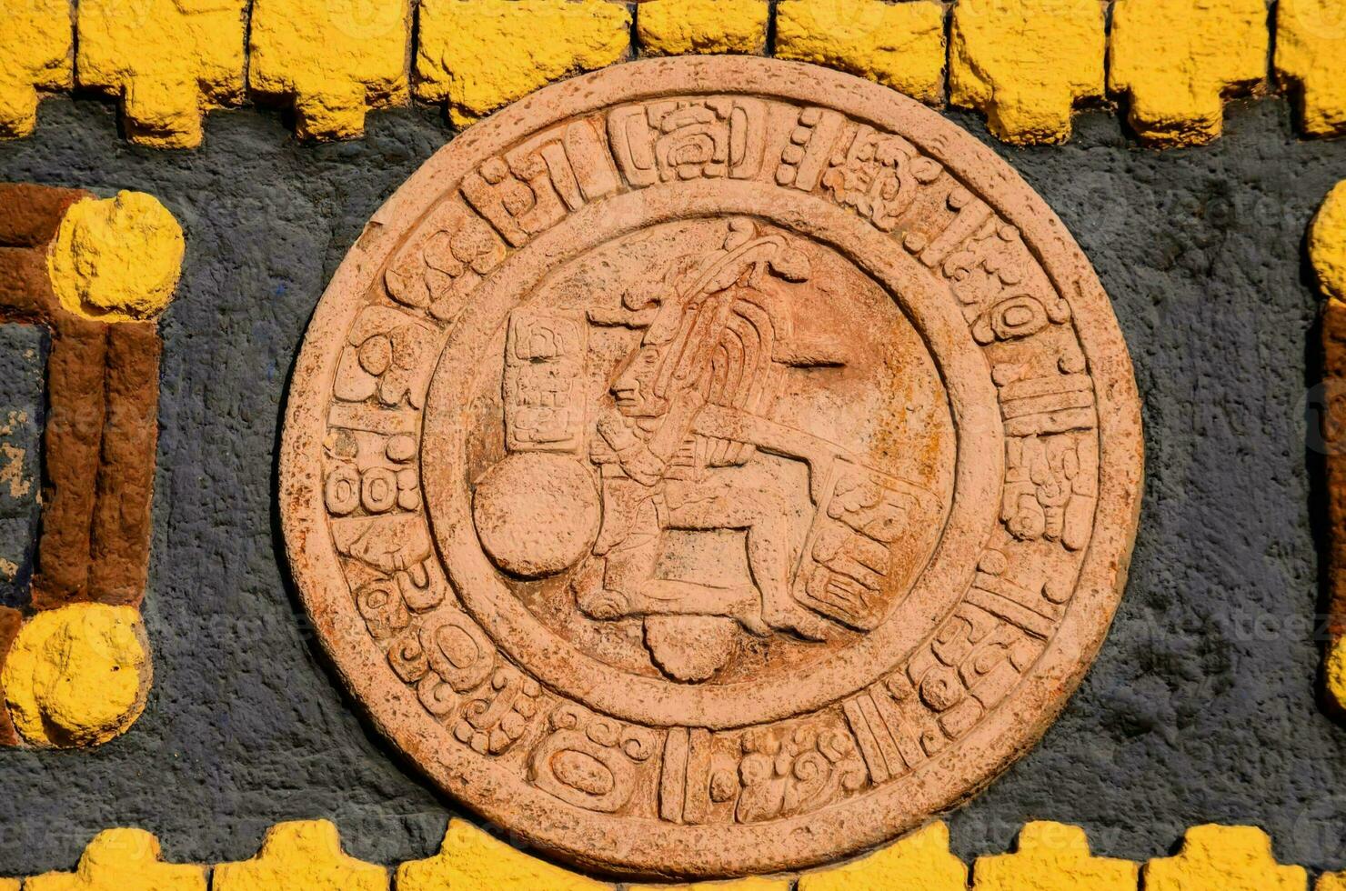 a stone plaque with a picture of a man and a woman photo