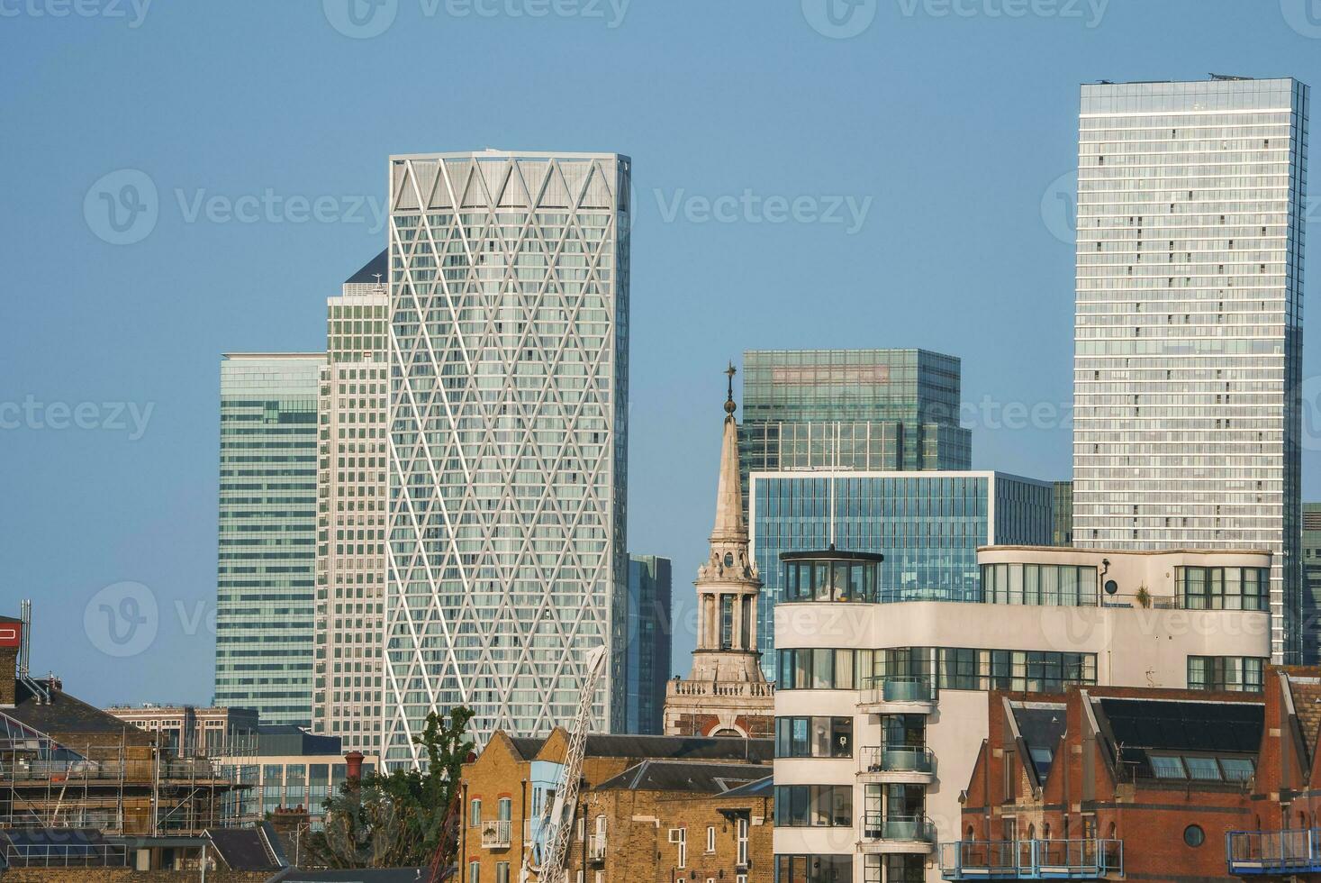 Residential and corporate buildings with blue sky background photo