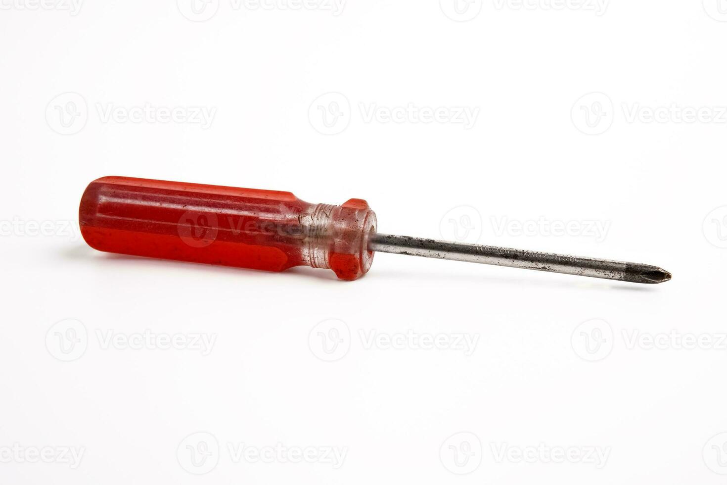 Closeup Photo Of Screwdriver With Red Plastic Handle Isolated On White Background