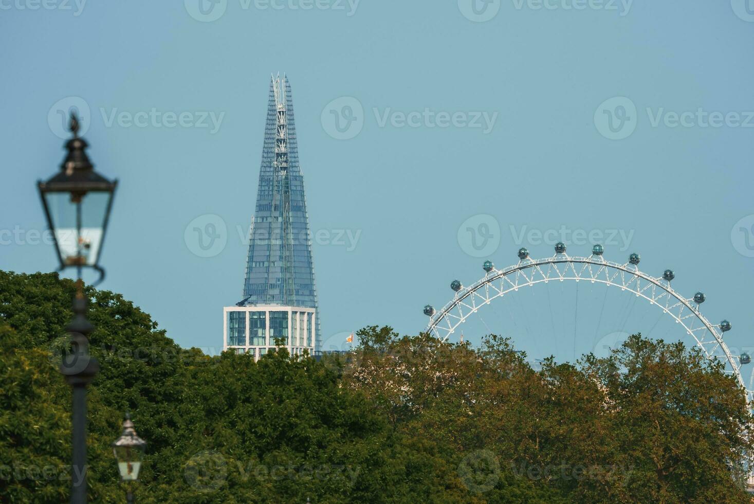 London Eye over Thames River in London. photo