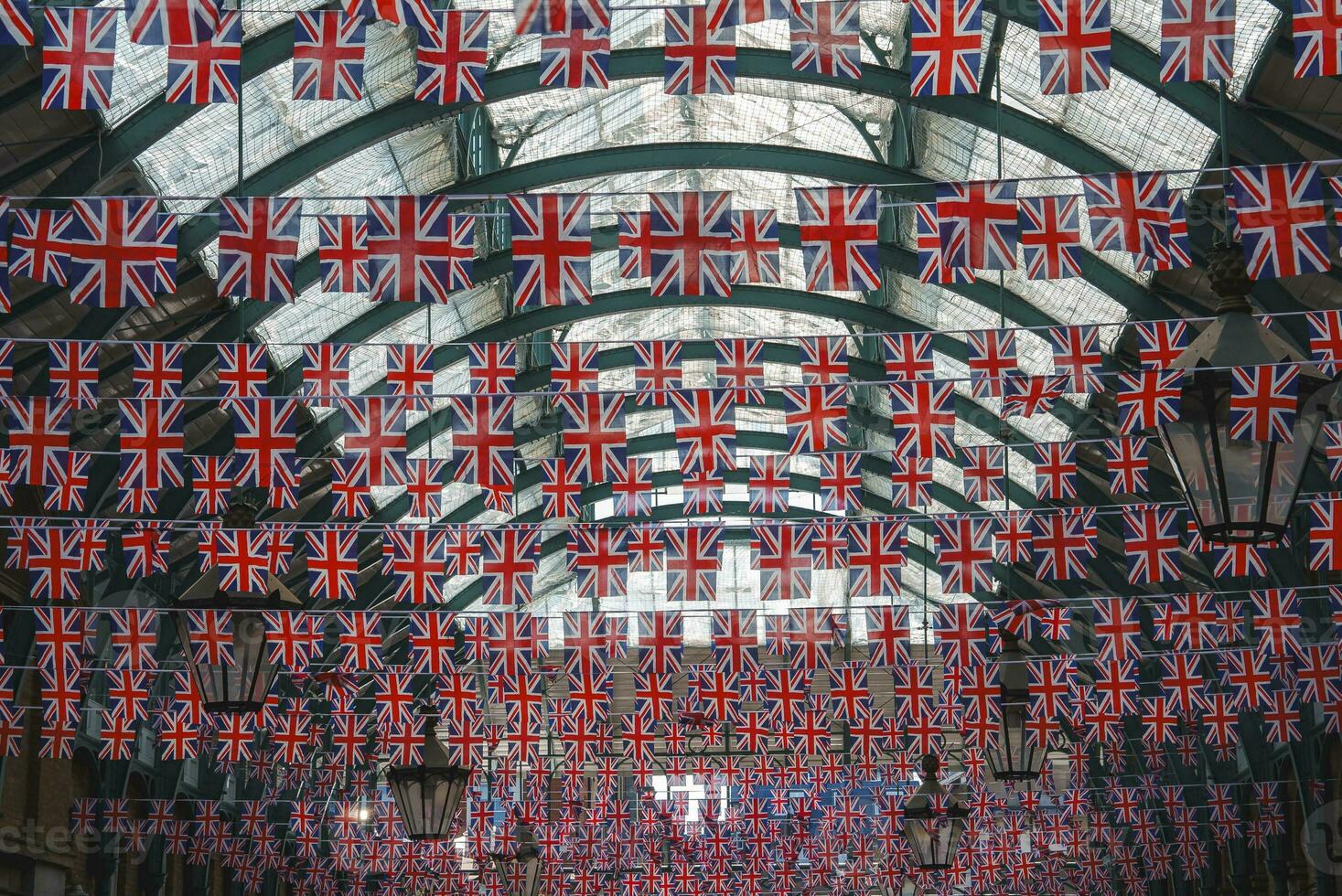National flags hanging from ceiling at Convent Garden in London photo