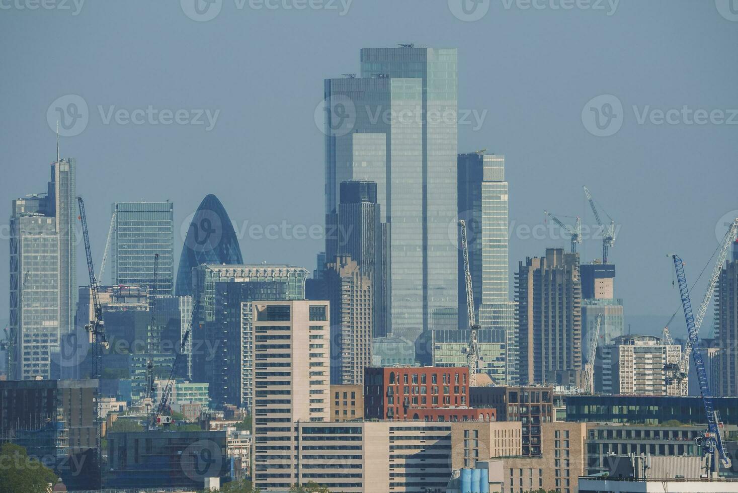 Modern skyscrapers of city with sky in background at London photo