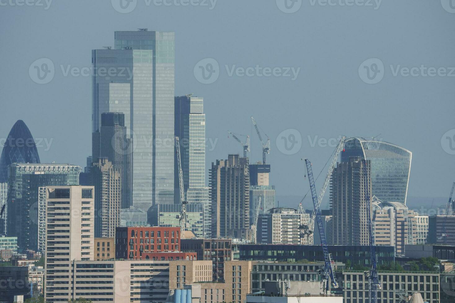 View of skyscrapers of city with sky in background at London photo