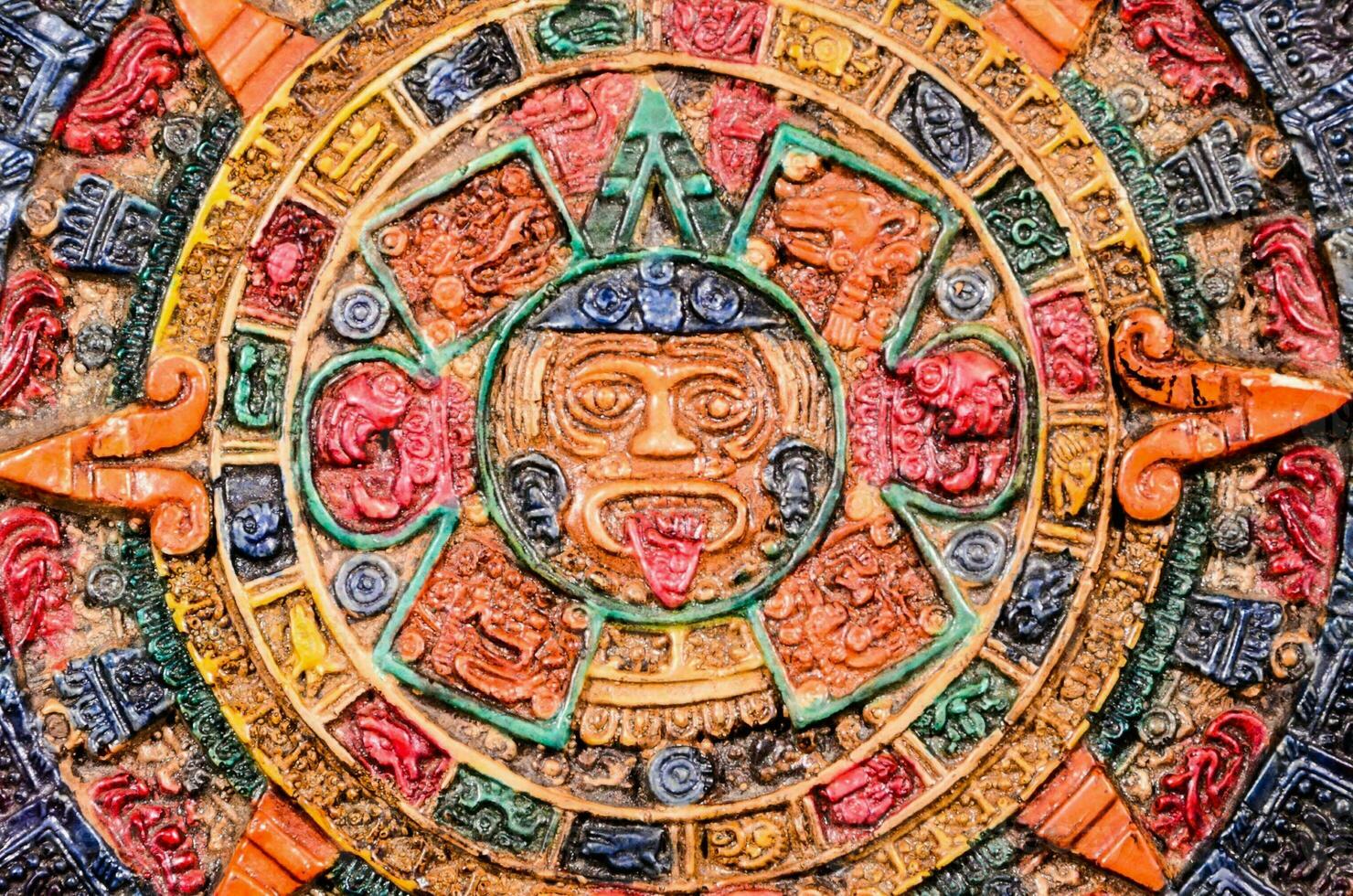 the mayan calendar is a colorful, decorative object photo