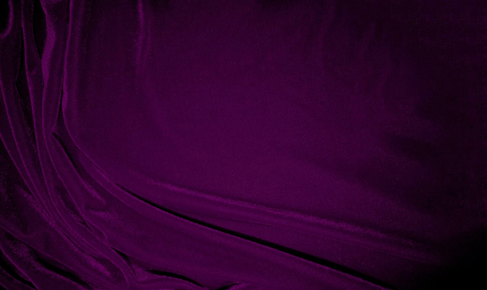 Pink velvet fabric texture used as background. Wine color panne fabric background of soft and smooth textile material. crushed velvet .luxury magenta tone for silk. photo