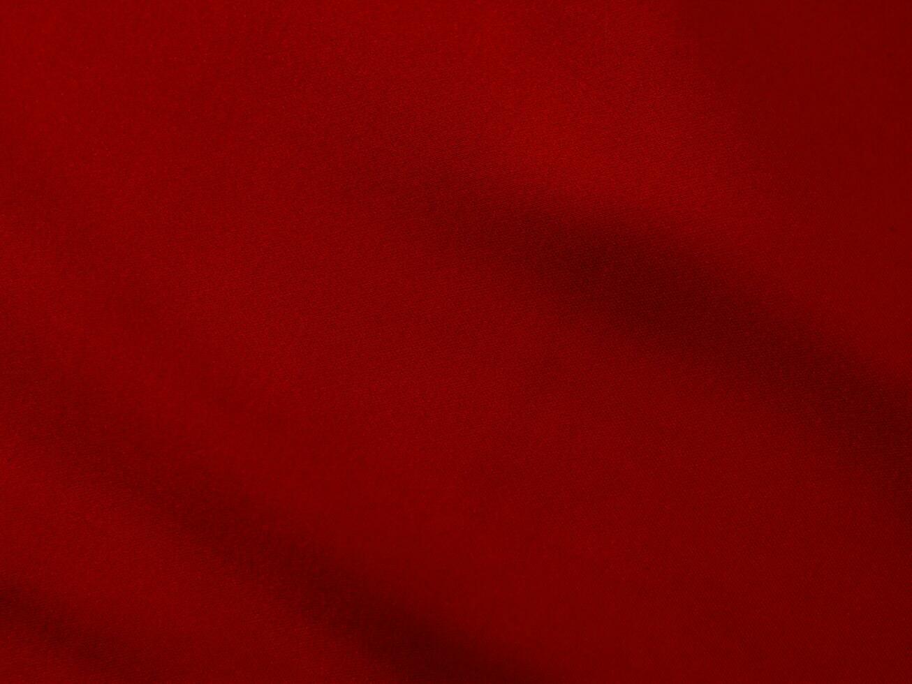 Red silk fabric texture used as background. red panne fabric background of soft and smooth textile material. crushed velvet .luxury scarlet for velvet. photo
