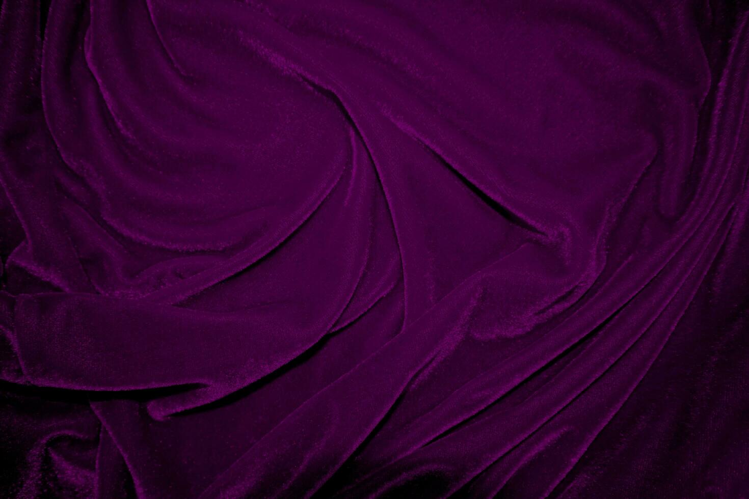 Pink velvet fabric texture used as background. Wine color panne fabric background of soft and smooth textile material. crushed velvet .luxury magenta tone for silk. photo