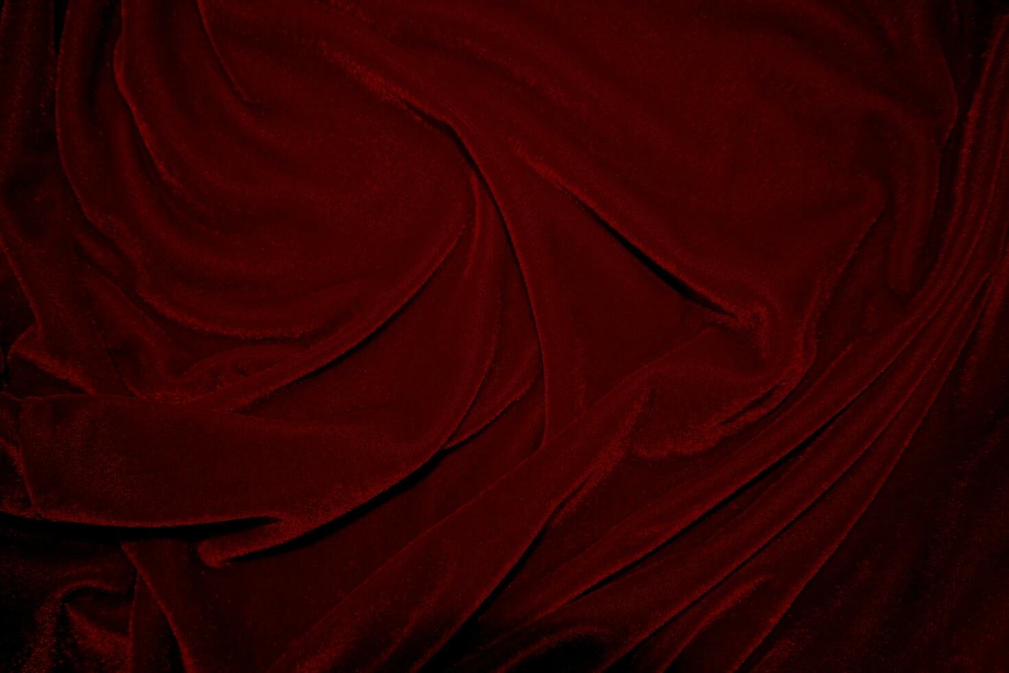 Red velvet fabric texture used as background. red panne fabric background of soft and smooth textile material. crushed velvet .luxury scarlet for silk. photo