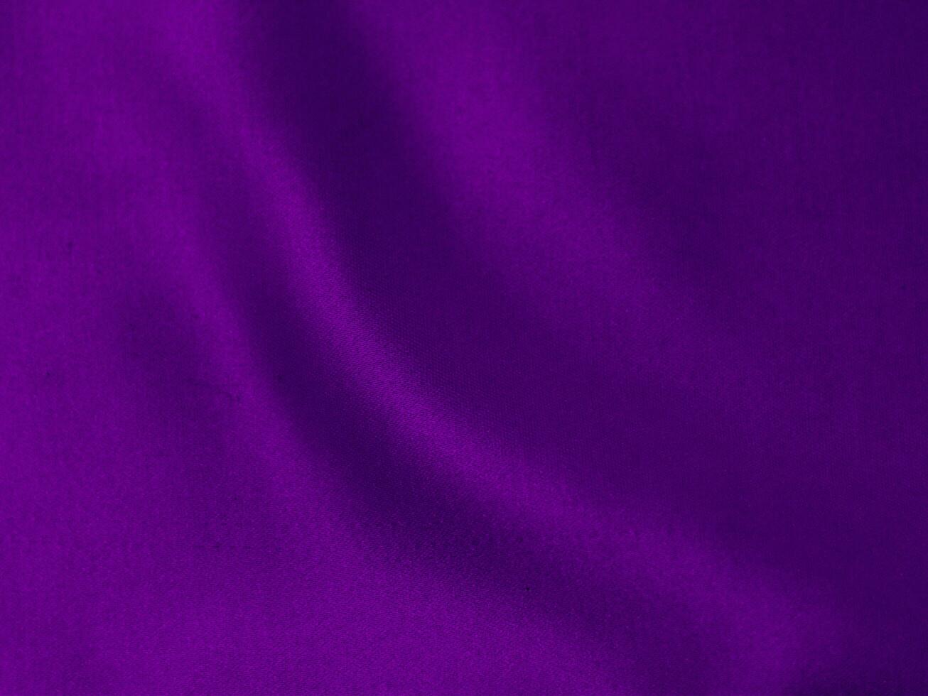 Dark purple velvet fabric texture used as background. Violet color panne fabric background of soft and smooth textile material. crushed velvet .luxury magenta tone for silk. photo